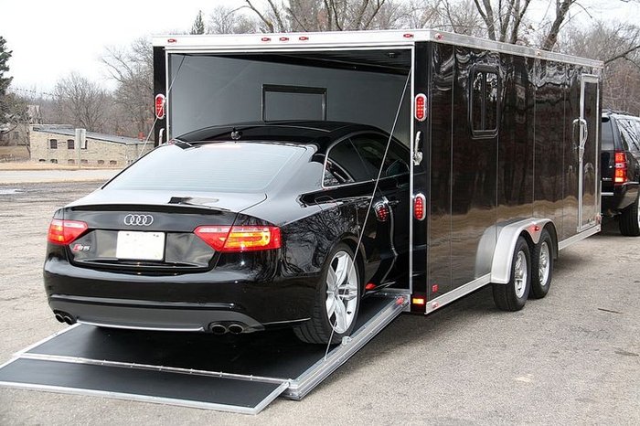 Car hauler trailer loading a car