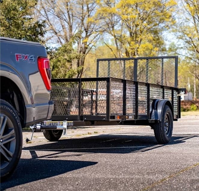 Utility trailer being towed